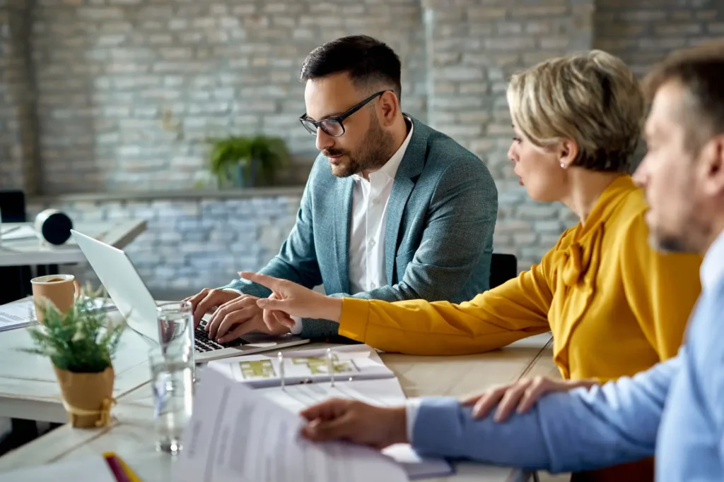 real estate agent using laptop while having a meet 2022 10 06 01 29 48 utc